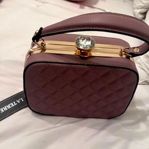 Women’s small clutch purse. Color brown. Brand new.